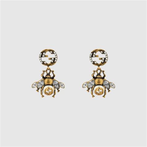 BOUCLES D'OREILLES GUCCI ABEILLES .